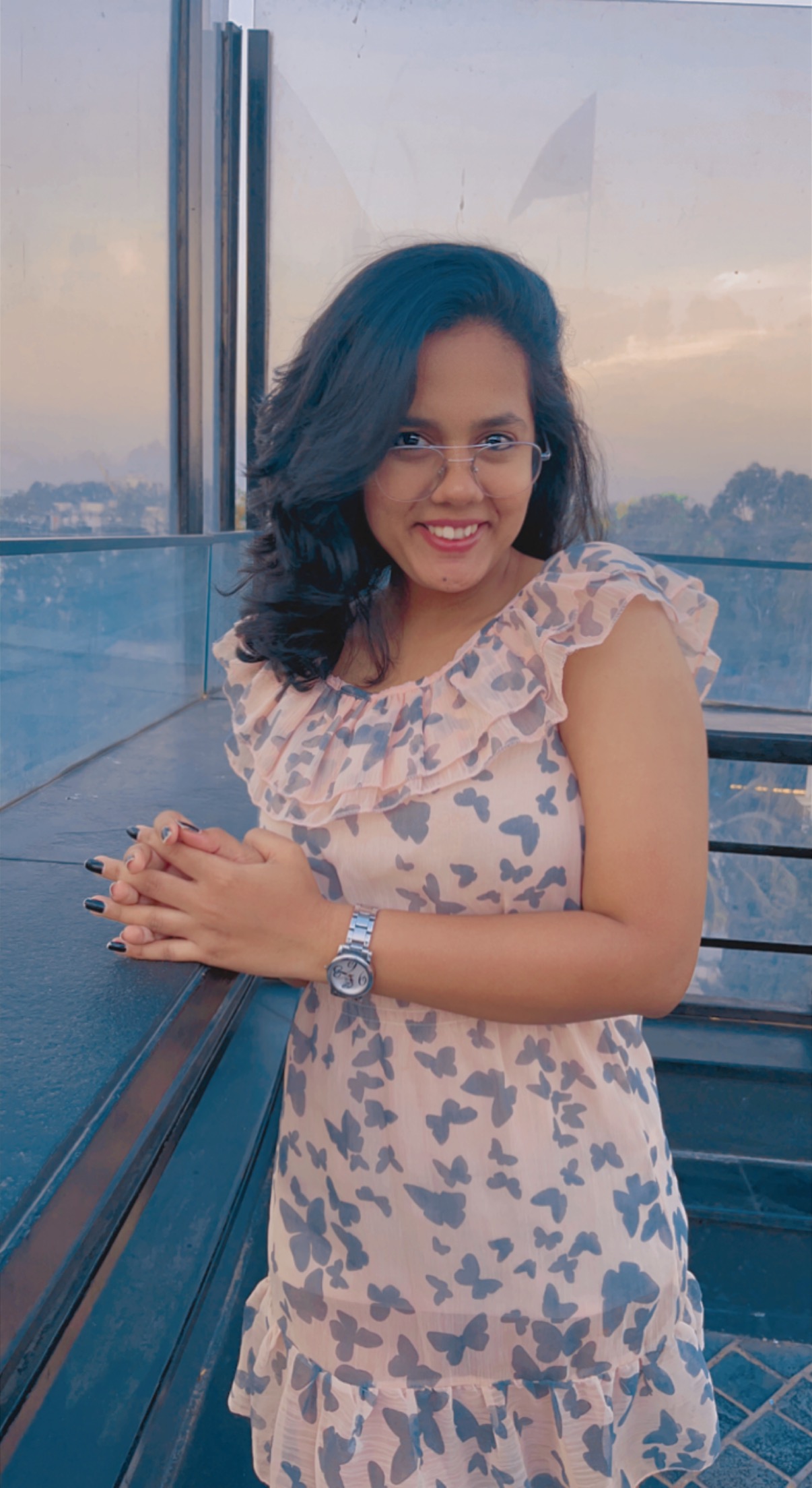 Kajal Rane smiling at a skyline viewpoint